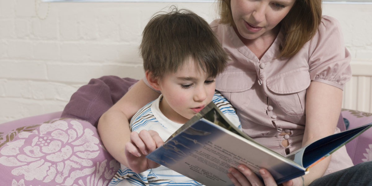 Mother Reading to Son