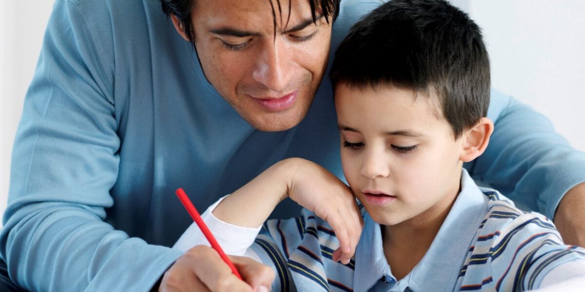 Father helping son with homework