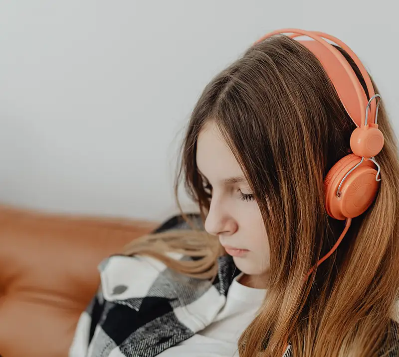 Young lady wearing headphones